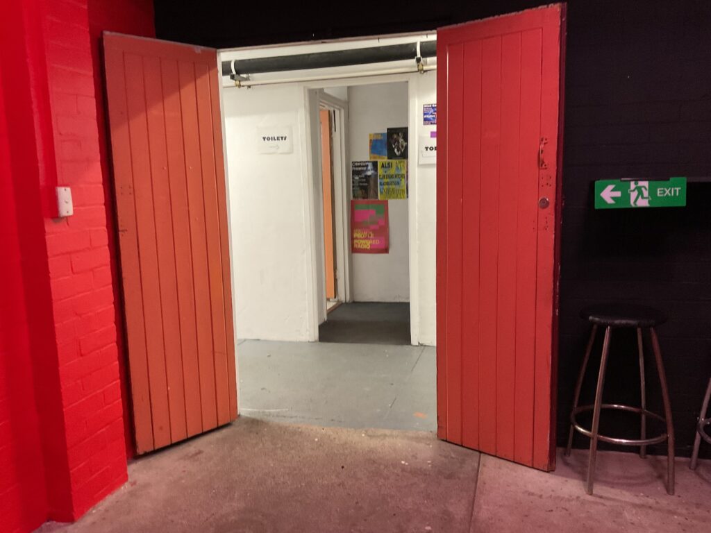 Shows large accessible internal doorway to Cyber Bunker’s open plan space.